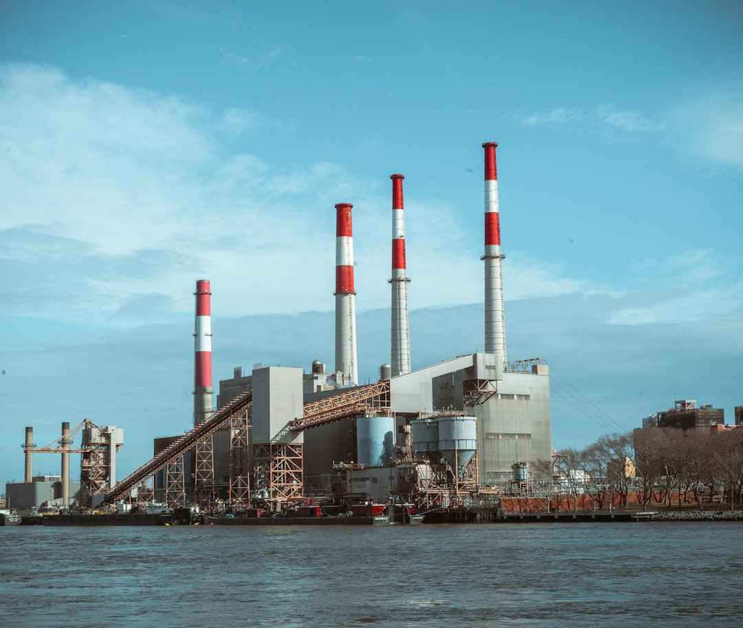Mastering the First Impression: Your intriguing post title goes here gray-and-red-factory-building-under-a-calm-blue-sky-9gwmiek9jny